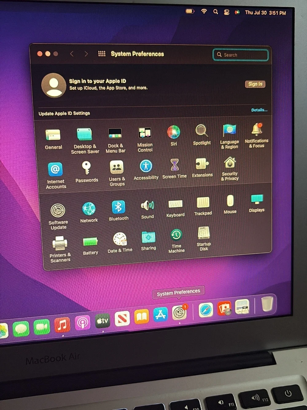 Apple MacBook Air Silver with Purple Gradient Display